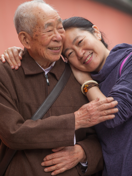 Elderly man and his middle aged daughter